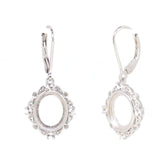 Sterling silver semi mount dangle earrings setting for oval cabochon, featuring leverback design and delicate detailing.